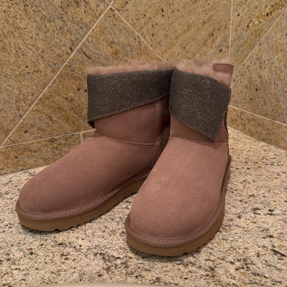 UGG woman’s mini boot. Size 7. Taupe color.